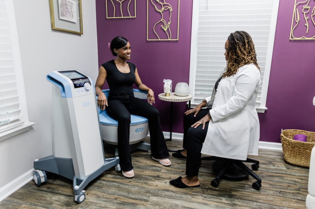 Emsella Patient sitting on emsella chair in medical spa